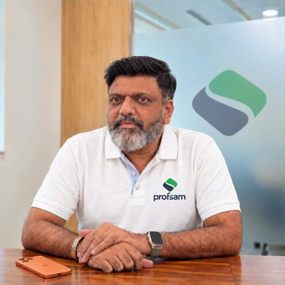 Swaminathan “Sam” Senguttuvan, founder of ProfSam, seated at a table